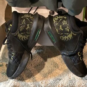 Nike Black and Green Athletic Shoes with Strap Design